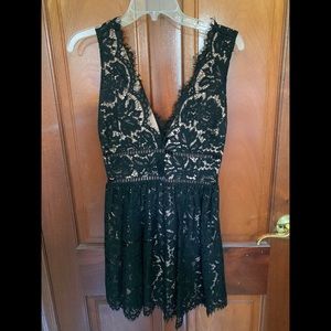 Black Lace Cocktail Dress with Deep V-Cut